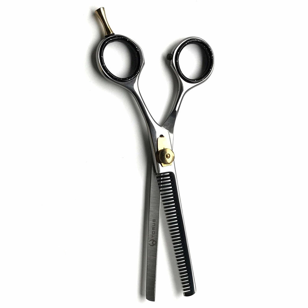 Stainless steel professional barber scissors for a clean, effortless cut.